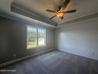 Premium lot! This gorgeous new construction home highlights on Riverwood Golf and Athletic Club in North Carolina - for sale on GolfHomes.com, golf home, golf lot