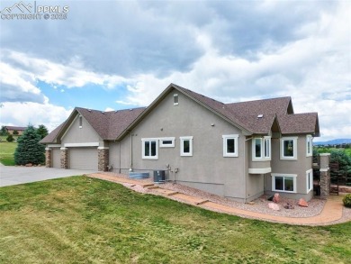 Beautifully situated on a spacious lot with sweeping Front Range on Kings Deer Golf Club in Colorado - for sale on GolfHomes.com, golf home, golf lot