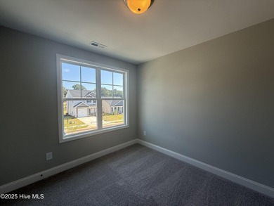 Premium lot! This gorgeous new construction home highlights on Riverwood Golf and Athletic Club in North Carolina - for sale on GolfHomes.com, golf home, golf lot