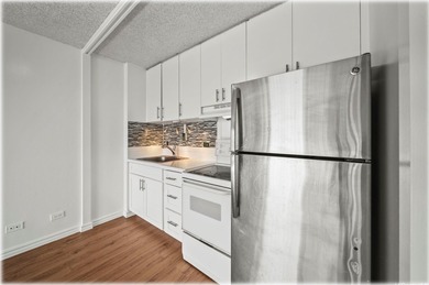 Studio Unit with Golf Course and Cityscape Views! Conveniently on Ala Wai Golf Course in Hawaii - for sale on GolfHomes.com, golf home, golf lot