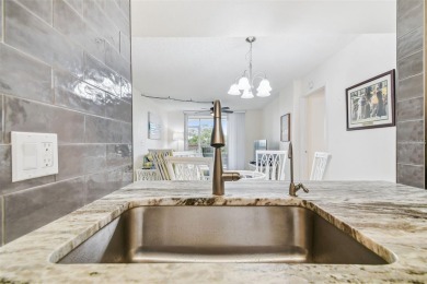 Discover this beautifully updated 2-bedroom, 2-bathroom condo on Feather Sound Country Club in Florida - for sale on GolfHomes.com, golf home, golf lot
