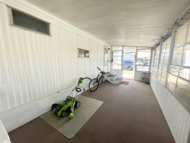 This home is located in a 55+ community!! This CUTE and UPDATED on Lone Palm Golf Club in Florida - for sale on GolfHomes.com, golf home, golf lot