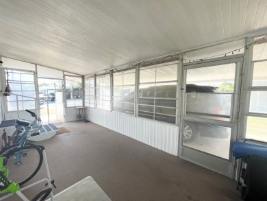 This home is located in a 55+ community!! This CUTE and UPDATED on Lone Palm Golf Club in Florida - for sale on GolfHomes.com, golf home, golf lot