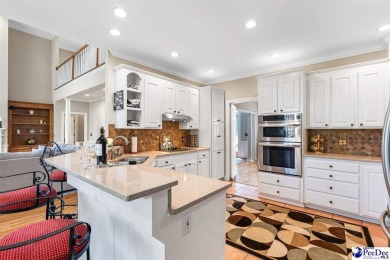 Welcome to 708 Muirfield Place, a stunning all-brick home on The Traces Golf Club in South Carolina - for sale on GolfHomes.com, golf home, golf lot