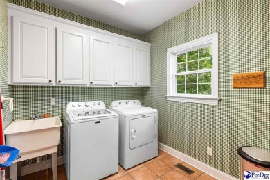 Welcome to 708 Muirfield Place, a stunning all-brick home on The Traces Golf Club in South Carolina - for sale on GolfHomes.com, golf home, golf lot
