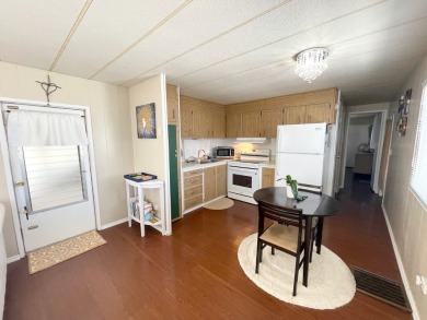 This home is located in a 55+ community!! This CUTE and UPDATED on Lone Palm Golf Club in Florida - for sale on GolfHomes.com, golf home, golf lot