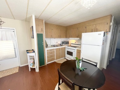 This home is located in a 55+ community!! This CUTE and UPDATED on Lone Palm Golf Club in Florida - for sale on GolfHomes.com, golf home, golf lot