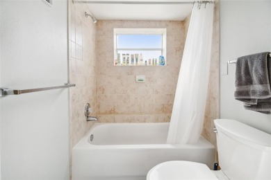 Discover this beautifully updated 2-bedroom, 2-bathroom condo on Feather Sound Country Club in Florida - for sale on GolfHomes.com, golf home, golf lot