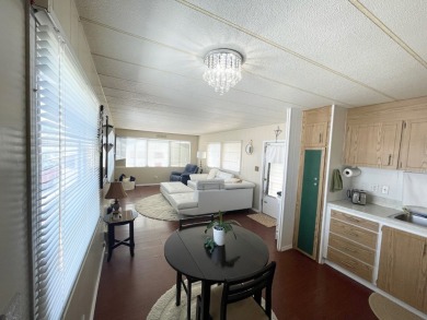 This home is located in a 55+ community!! This CUTE and UPDATED on Lone Palm Golf Club in Florida - for sale on GolfHomes.com, golf home, golf lot