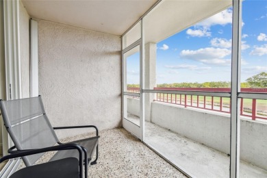 Discover this beautifully updated 2-bedroom, 2-bathroom condo on Feather Sound Country Club in Florida - for sale on GolfHomes.com, golf home, golf lot
