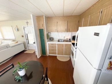 This home is located in a 55+ community!! This CUTE and UPDATED on Lone Palm Golf Club in Florida - for sale on GolfHomes.com, golf home, golf lot