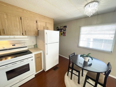 This home is located in a 55+ community!! This CUTE and UPDATED on Lone Palm Golf Club in Florida - for sale on GolfHomes.com, golf home, golf lot