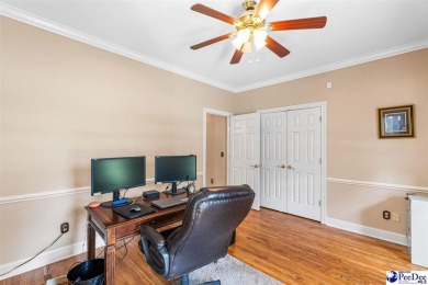 Welcome to 708 Muirfield Place, a stunning all-brick home on The Traces Golf Club in South Carolina - for sale on GolfHomes.com, golf home, golf lot