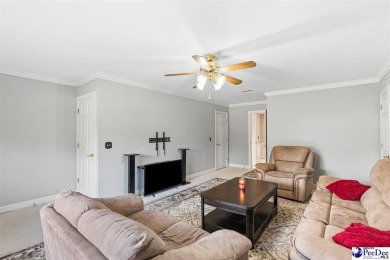 Welcome to 708 Muirfield Place, a stunning all-brick home on The Traces Golf Club in South Carolina - for sale on GolfHomes.com, golf home, golf lot