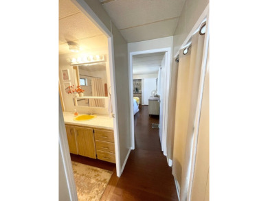 This home is located in a 55+ community!! This CUTE and UPDATED on Lone Palm Golf Club in Florida - for sale on GolfHomes.com, golf home, golf lot