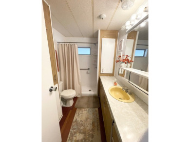 This home is located in a 55+ community!! This CUTE and UPDATED on Lone Palm Golf Club in Florida - for sale on GolfHomes.com, golf home, golf lot