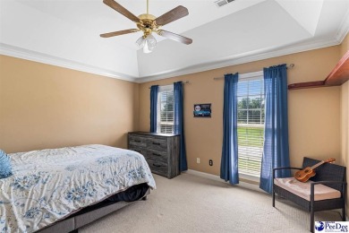 Welcome to 708 Muirfield Place, a stunning all-brick home on The Traces Golf Club in South Carolina - for sale on GolfHomes.com, golf home, golf lot