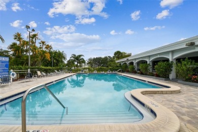Discover this beautifully updated 2-bedroom, 2-bathroom condo on Feather Sound Country Club in Florida - for sale on GolfHomes.com, golf home, golf lot