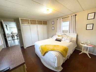 This home is located in a 55+ community!! This CUTE and UPDATED on Lone Palm Golf Club in Florida - for sale on GolfHomes.com, golf home, golf lot