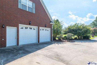 Welcome to 708 Muirfield Place, a stunning all-brick home on The Traces Golf Club in South Carolina - for sale on GolfHomes.com, golf home, golf lot