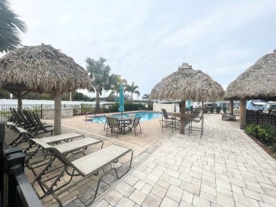 This home is located in a 55+ community!! This CUTE and UPDATED on Lone Palm Golf Club in Florida - for sale on GolfHomes.com, golf home, golf lot