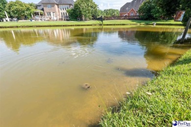 Welcome to 708 Muirfield Place, a stunning all-brick home on The Traces Golf Club in South Carolina - for sale on GolfHomes.com, golf home, golf lot