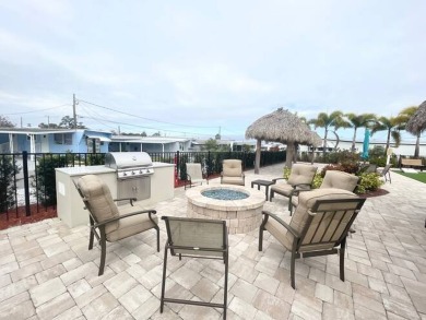 This home is located in a 55+ community!! This CUTE and UPDATED on Lone Palm Golf Club in Florida - for sale on GolfHomes.com, golf home, golf lot
