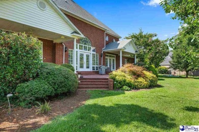 Welcome to 708 Muirfield Place, a stunning all-brick home on The Traces Golf Club in South Carolina - for sale on GolfHomes.com, golf home, golf lot