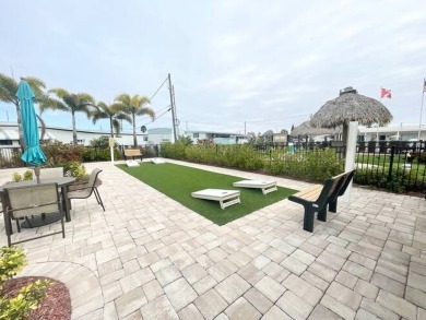 This home is located in a 55+ community!! This CUTE and UPDATED on Lone Palm Golf Club in Florida - for sale on GolfHomes.com, golf home, golf lot