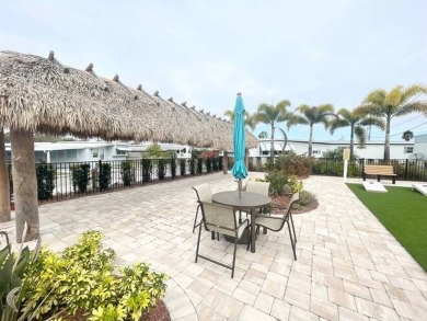 This home is located in a 55+ community!! This CUTE and UPDATED on Lone Palm Golf Club in Florida - for sale on GolfHomes.com, golf home, golf lot