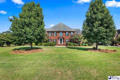Welcome to 708 Muirfield Place, a stunning all-brick home on The Traces Golf Club in South Carolina - for sale on GolfHomes.com, golf home, golf lot
