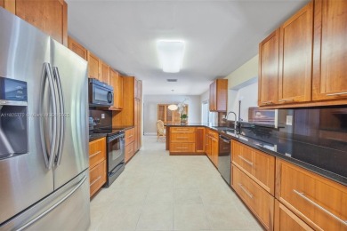 Welcome to your move-in-ready oasis in desirable Kendale South! on Killian Greens Golf Club in Florida - for sale on GolfHomes.com, golf home, golf lot