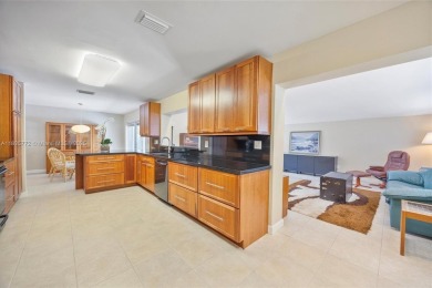 Welcome to your move-in-ready oasis in desirable Kendale South! on Killian Greens Golf Club in Florida - for sale on GolfHomes.com, golf home, golf lot