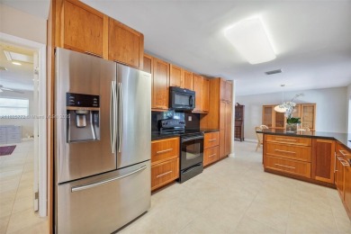 Welcome to your move-in-ready oasis in desirable Kendale South! on Killian Greens Golf Club in Florida - for sale on GolfHomes.com, golf home, golf lot