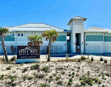 Beautifully furnished 3BR/2.5BA end-unit townhome in the gated on Lost Key Golf Club in Florida - for sale on GolfHomes.com, golf home, golf lot