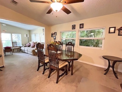 This 2bed/2bath Palm Harbor stucco home features a large on Del Tura Golf and Country Club in Florida - for sale on GolfHomes.com, golf home, golf lot