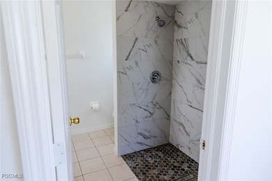 Move-in ready 4BR/2BA home with key system upgrades! Featuring a on Burnt Store Golf Club in Florida - for sale on GolfHomes.com, golf home, golf lot