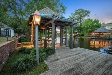 Experience luxury living on the water in sought-after Canebrake! on Canebrake Country Club in Mississippi - for sale on GolfHomes.com, golf home, golf lot