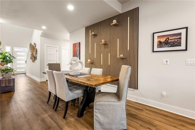 Modern design meets luxury living in this impressive 4-bedroom on Big Sugar Golf Club in Arkansas - for sale on GolfHomes.com, golf home, golf lot