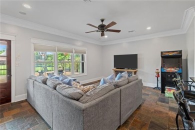 Located in one of Lake Charles' most sought-after golf course on Gray Plantation Golf Course in Louisiana - for sale on GolfHomes.com, golf home, golf lot
