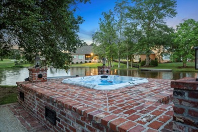 Experience luxury living on the water in sought-after Canebrake! on Canebrake Country Club in Mississippi - for sale on GolfHomes.com, golf home, golf lot