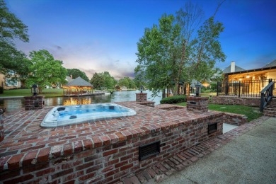 Experience luxury living on the water in sought-after Canebrake! on Canebrake Country Club in Mississippi - for sale on GolfHomes.com, golf home, golf lot