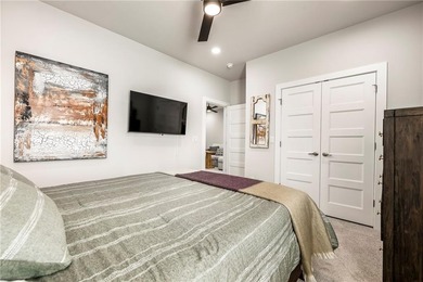 Modern design meets luxury living in this impressive 4-bedroom on Big Sugar Golf Club in Arkansas - for sale on GolfHomes.com, golf home, golf lot