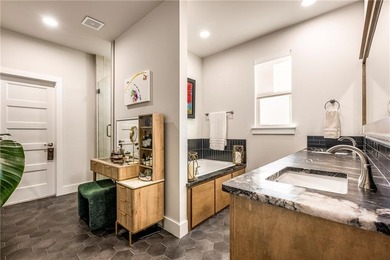 Modern design meets luxury living in this impressive 4-bedroom on Big Sugar Golf Club in Arkansas - for sale on GolfHomes.com, golf home, golf lot