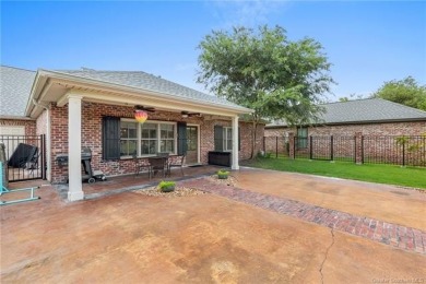 Located in one of Lake Charles' most sought-after golf course on Gray Plantation Golf Course in Louisiana - for sale on GolfHomes.com, golf home, golf lot