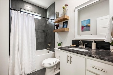 Modern design meets luxury living in this impressive 4-bedroom on Big Sugar Golf Club in Arkansas - for sale on GolfHomes.com, golf home, golf lot