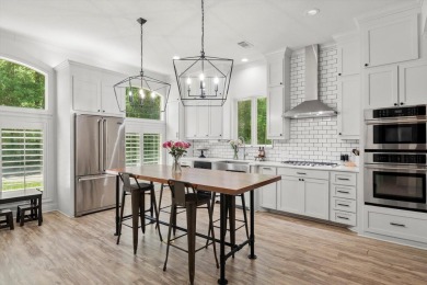 Experience luxury living on the water in sought-after Canebrake! on Canebrake Country Club in Mississippi - for sale on GolfHomes.com, golf home, golf lot