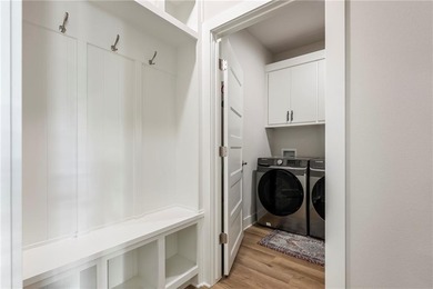 Modern design meets luxury living in this impressive 4-bedroom on Big Sugar Golf Club in Arkansas - for sale on GolfHomes.com, golf home, golf lot