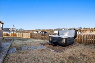 Modern design meets luxury living in this impressive 4-bedroom on Big Sugar Golf Club in Arkansas - for sale on GolfHomes.com, golf home, golf lot