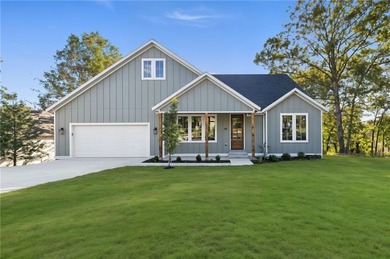 Welcome to 31 Cullen Hills Drive--a stunning 3-bedroom + office on Bella Vista Country Club - Scottsdale in Arkansas - for sale on GolfHomes.com, golf home, golf lot